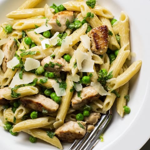 Tender chicken, sweet peas, and fresh mint coat al dente penne in a glossy, zesty lemon sauce.